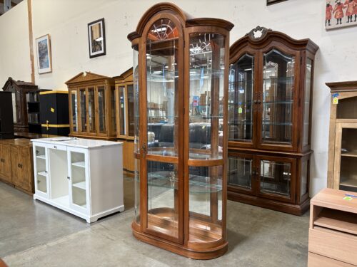 PULASKI Arch Top Illuminated Curio Cabinet with Mirrored Back and False Key Handle