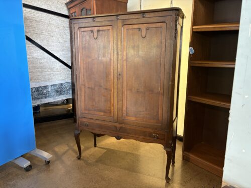Antique Cabinet with Tall Cabriole Legs and Distinctive Carved Corners