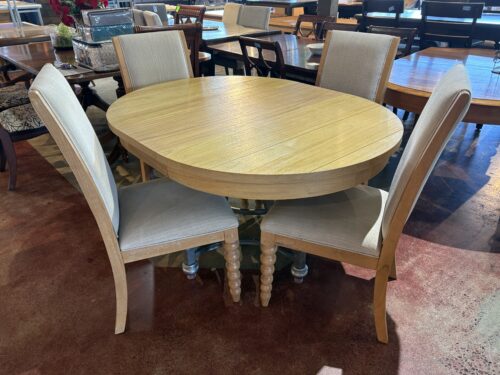 Oak Pedestal Table and Four Upholstered Dining Chairs with Unique Spindle Legs