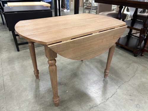 French Provincial Inspired Round Drop-Leaf Dining Table with Rustic Texture and Turned Legs