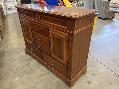 BASSETT Warm Cherry Finish 7 Drawer Dresser with Dual Cabinets and Decorative Swing Pulls