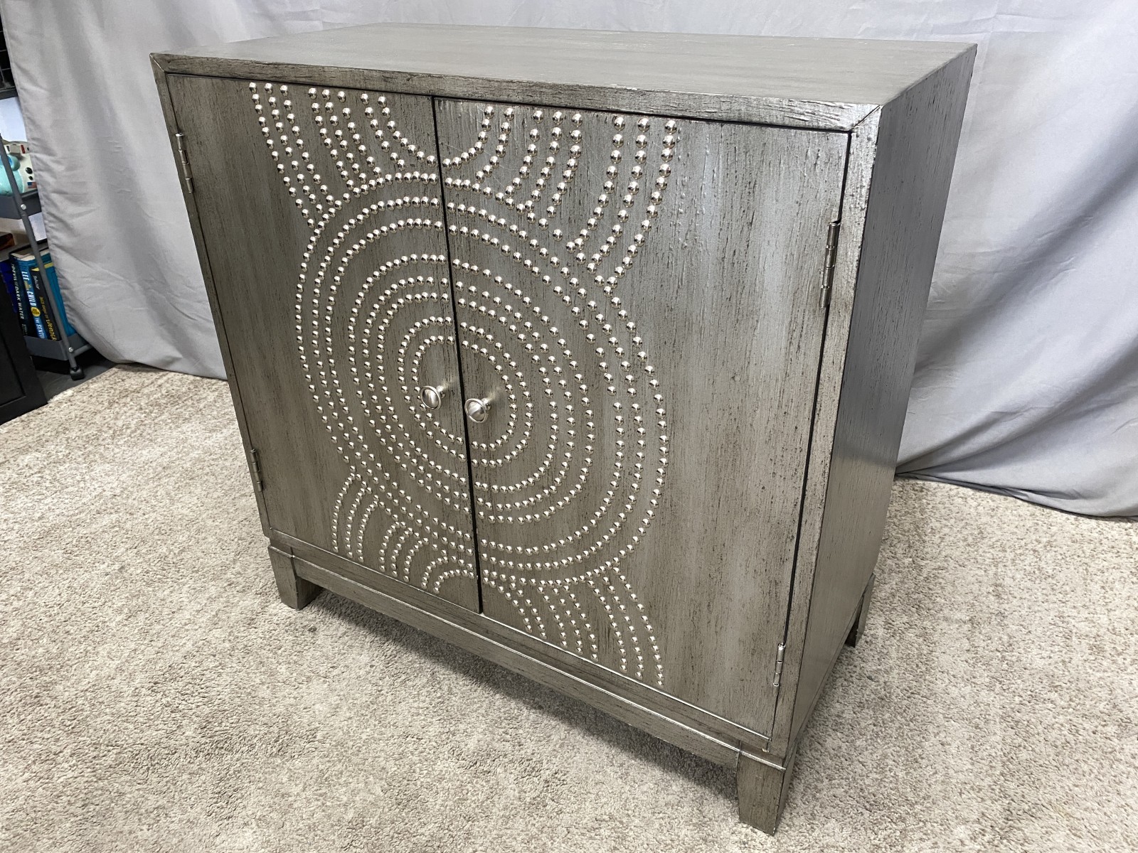 COAST TO COAST Grey Riveted 2-Door Accent Cabinet