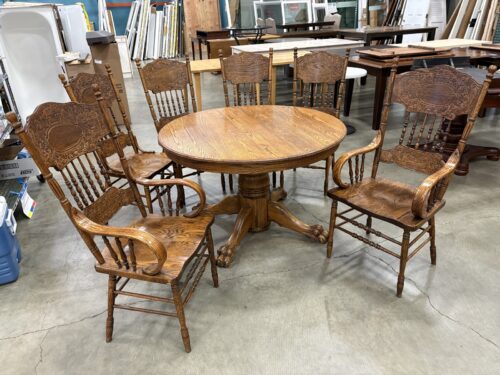 Vintage Round Solid Oak Dining Table with Calw Feet and 6 Intricately Carved Chairs