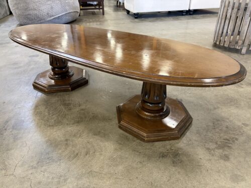 Vintage Dark Finish Wooden Double Pedestal Coffee Table with Oval Top and Hexagonal Tiered Bases
