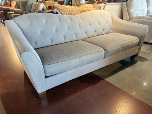 Light Gray Camelback Sofa with Button Tufted Backrest