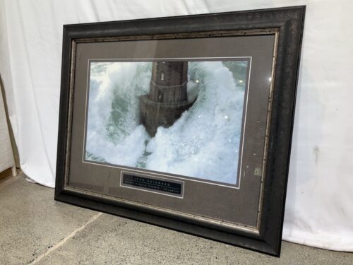 "The Lighthouse of La Jument" by Jean Cuichard Framed Print