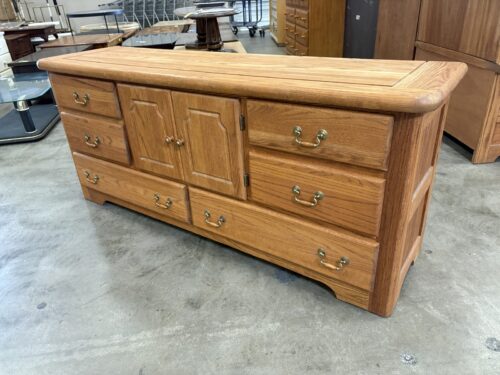 Vintage Solid Oak 8 Drawer Triple Dresser with Wood and Brass Swing Pulls