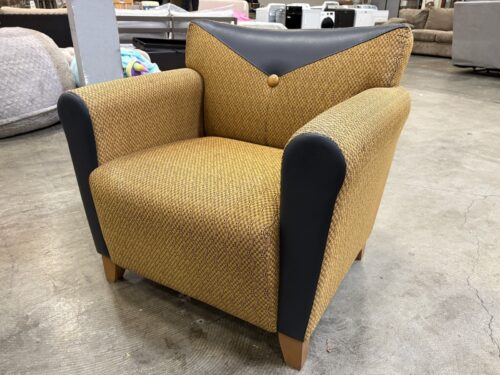 Vintage Accent Chair with Unique Geometric Patterned Upholstery and Navy Blue Leather Panels