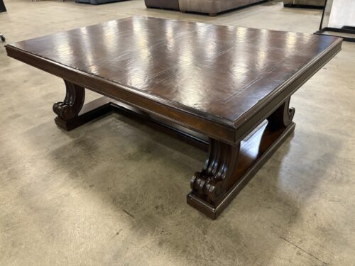 Dark Finish Rectangular Coffee Table with Patterned Veneer Top and Scrolled trestle Pedestal Feet