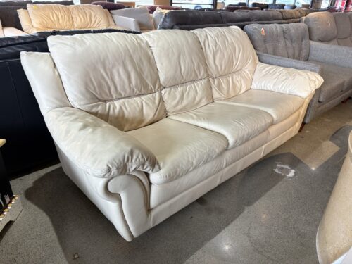 Cream Colored Leather Sofa with Plush Rounded Arms