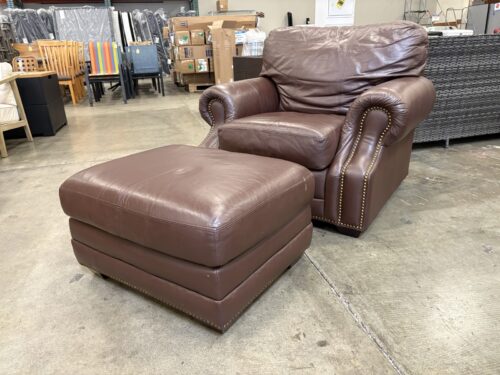 Brown Plush Leather Armchair with Ottoman Featuring Brass Nailhead Trim