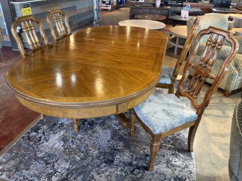 Spacious 4-Seater Oval Pedestal Dining Set