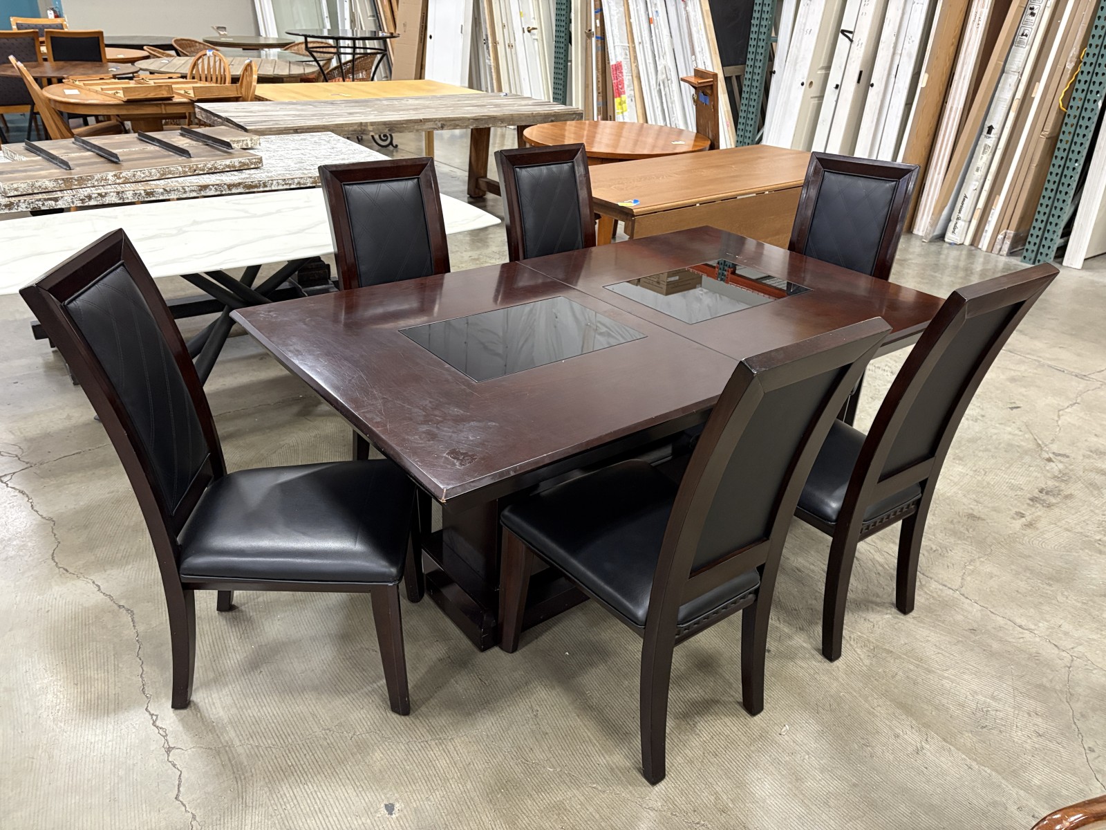 Contemporary Dark Finished Extendable Dining Table with 6 Black Quilted Leather Chairs