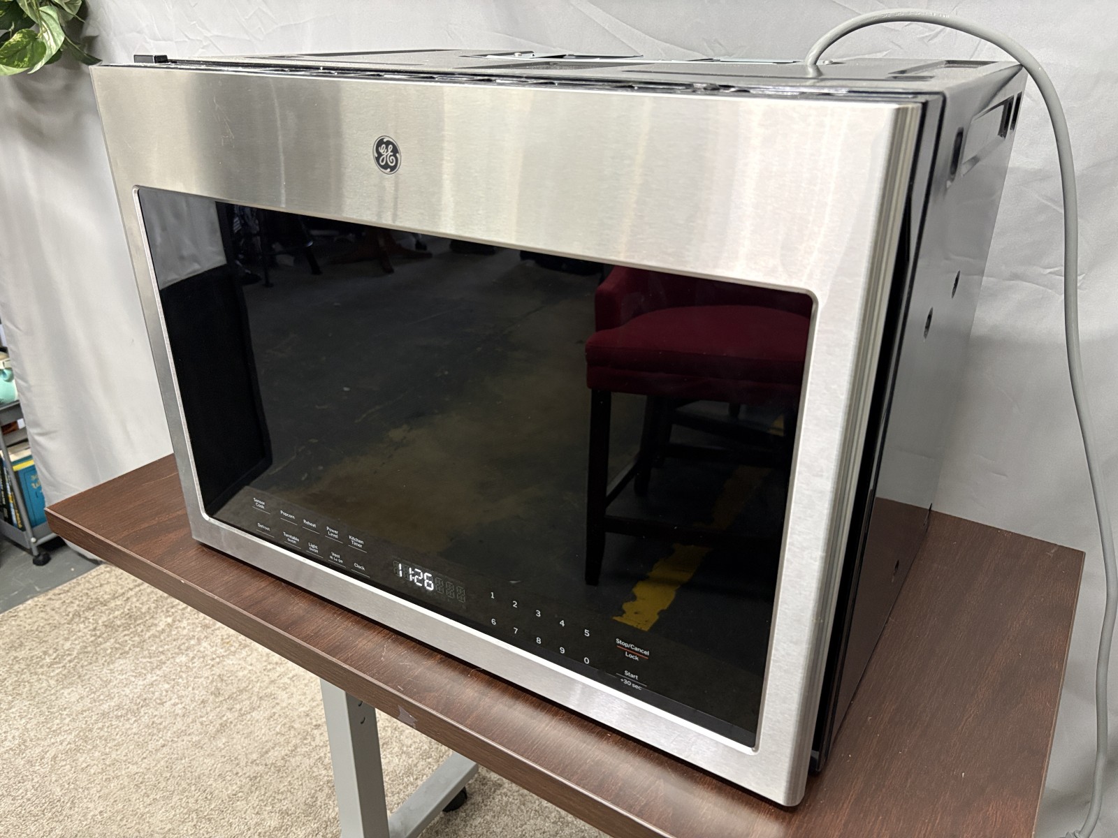 GE 1.4 cu ft Over the Range Microwave Model # GVMB14S4W1SS
