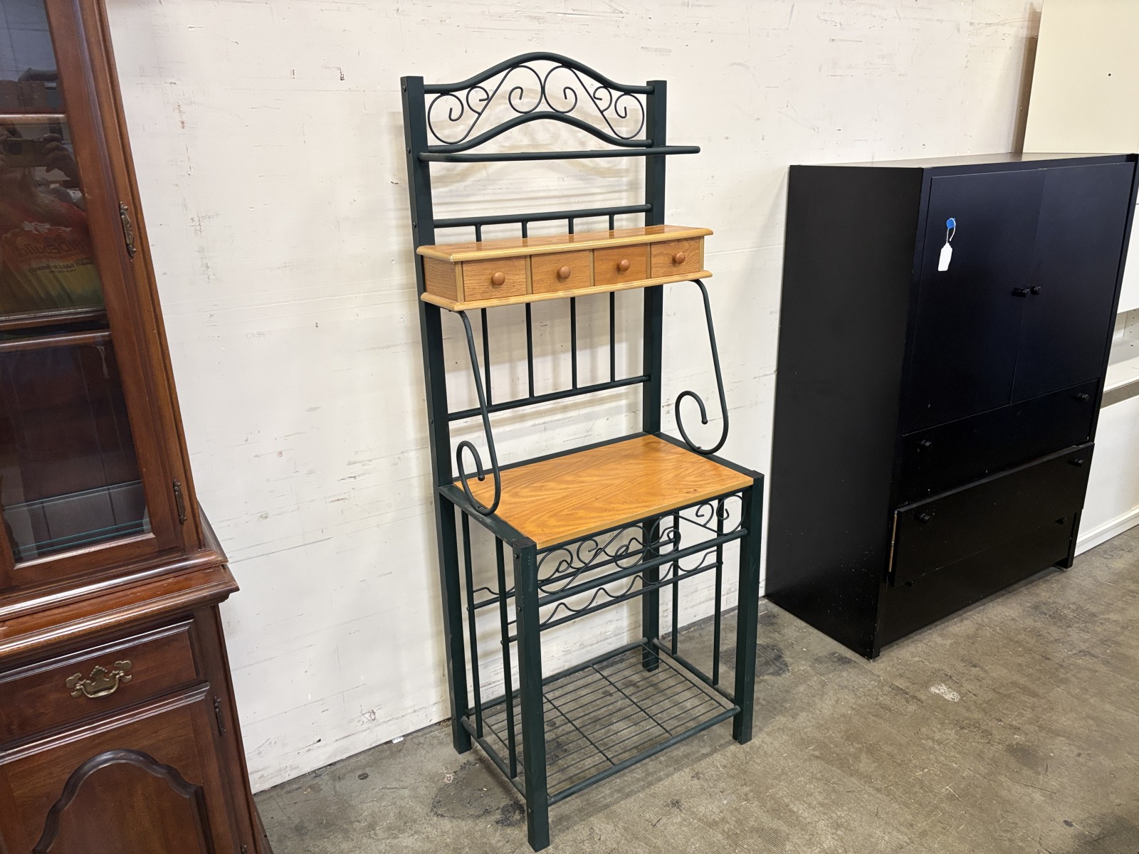 Vintage Baker’s Rack Featuring Dark Green Metal Base and Wooden Surface