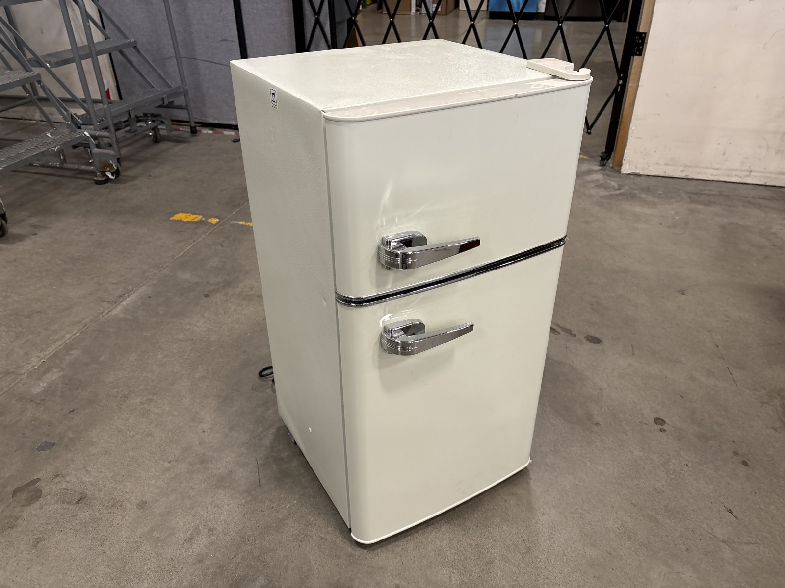 Ivory 3.5 Cu. Ft Compact Top-Freezer Refrigerator with Chrome Look Handles Model # BCD-100