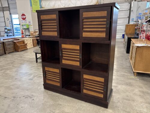 PIER 1 IMPORTS Dark Finished Sliding Door Bookcase with Mixed Tone Slatted Door Fronts