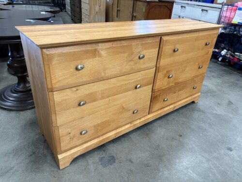Honey Finished 6 Drawer Dresser with Oval Silver Pulls